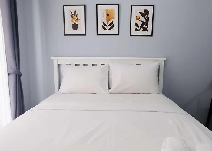 Minimalist Studio At Grand Asia Afrika Apartment By Travelio